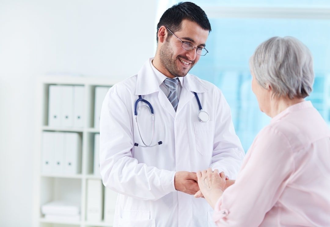 Image of doctor talking to patient.